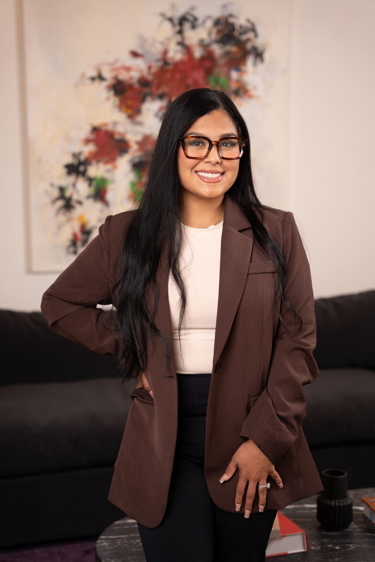 Angie Aguilar in a brown blazer