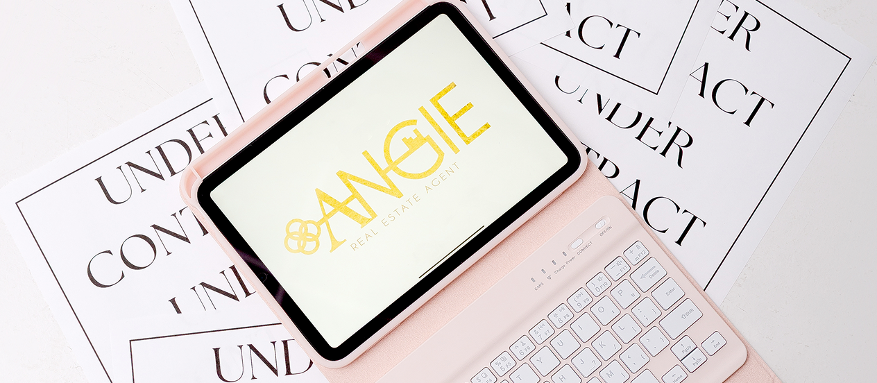 Tablet with the Angie logo on under contract documents