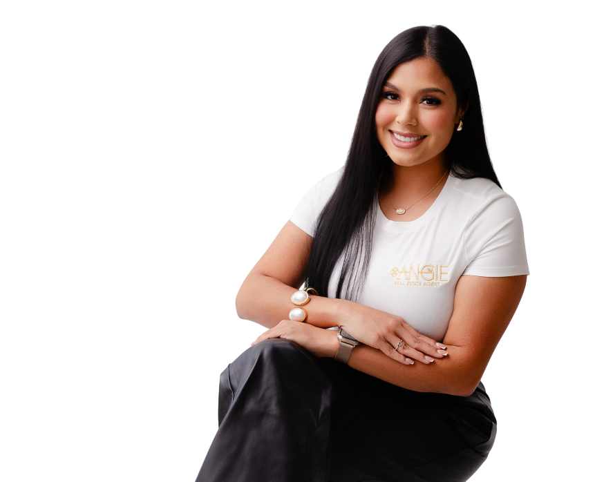 Angie Aguilar, Texas real estate agent, seated and smiling