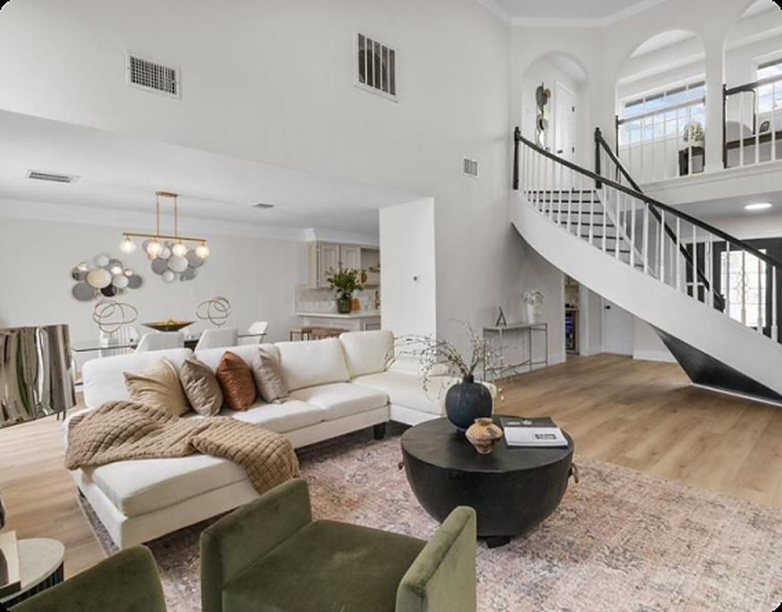 Bright living room with a spiral staircase